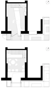 A modern floor plan with a living area, dining area, kitchen, and bedroom, featuring wood flooring, white walls, and natural light