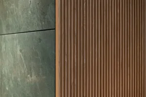 A modern interior space with a wooden wall featuring brown wood panel design, creating a sense of depth and visual interest
