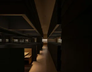 Bright modern restaurant with a long hallway, tables, chairs, and lighting