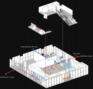 A modern building's interior floor plan with open areas and smaller rooms, featuring concrete floors and walls, and well-lit with natural and artificial light