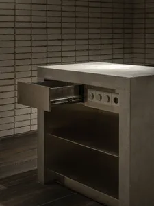 Empty kitchen countertop with a sleek stainless steel finish, clean lines, and a focus on functionality and simplicity