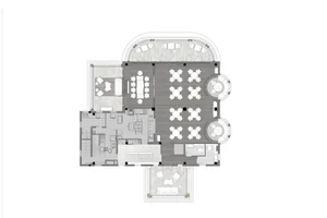 A 2D floor plan of a large building's interior with multiple dining tables, chairs, and couches arranged throughout the space, featuring potted plants and a comfortable atmosphere