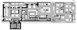 2D floor plan of a modern building interior with multiple chairs and a functional layout