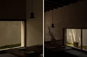 A warm and inviting dining area with wooden tables, chairs, and natural light from a window
