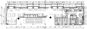 Architectural drawing of a multi-level residential building with a kitchen and dining area, featuring different levels and chairs in the dining area
