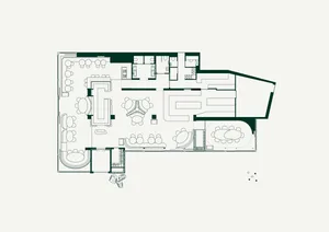 A well-designed living area with couches, chairs, and dining tables, creating a comfortable and inviting atmosphere
