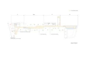White and black floor plan of a modern hotel with various rooms and spaces, including a lobby and restaurant