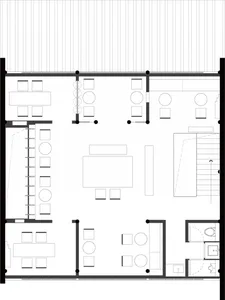 A clean and minimalist office space with white walls, a simple layout, and no furniture or decorations