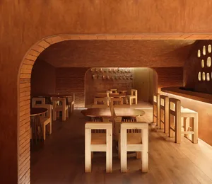 Warm and inviting restaurant interior with wooden floors and walls, featuring dining tables and chairs, and various items on the tables