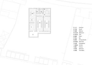Modern lobby with multiple rooms, chairs, and a welcoming atmosphere