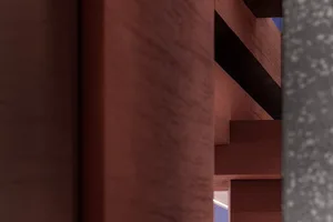 A wooden staircase in front of a stone wall, creating a sense of depth and dimension