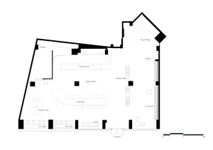 Empty modern space with a black outline of a floor plan, featuring simple lines and geometric shapes, with dim lighting