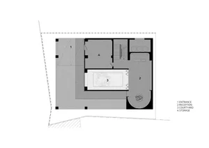 A modern house floor plan with white walls, featuring a living area, kitchen, dining area, and bedroom, with clean lines and minimalistic design elements