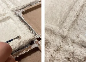 一個擺滿各種美術用品與工具的工作空間，包括剪刀與刀具，用於創作雕塑或裝置藝術
