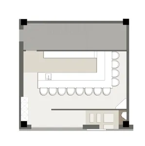 2D floor plan of a hotel with diverse room layouts, well-lit with natural light through windows and skylights