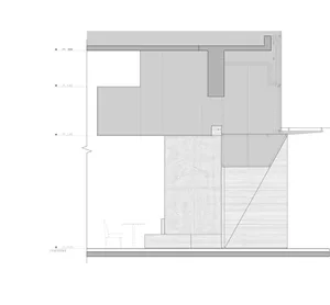 Black and white floor plan of a modern house with various rooms and seating areas