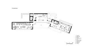 2D floor plan of a modern hotel or office complex with various rooms and spaces, clean lines, and minimalistic elements