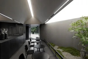 Inviting restaurant interior with multiple tables and chairs, well-lit by natural light from windows