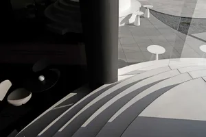 A modern building with a large pillar and several tables in a minimalist space with clean lines and simple design elements