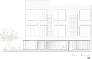 A modern building with a concrete exterior, featuring large windows and pedestrians walking around the exterior