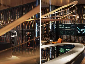 Modern interior space with chairs and a clock on the wall, featuring a stylish and functional design