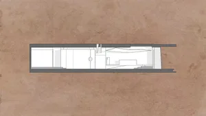 2D floor plan of a modern hotel with concrete walls, various rooms, and labeled connections