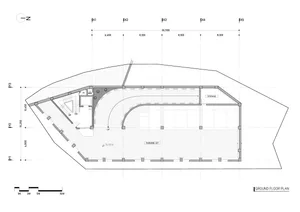 A modern floor plan with a large open area featuring a kitchen and living room, represented in white and gray tones