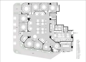 2D floor plan of a modern hotel with multiple rooms and hallways, featuring furniture and linework