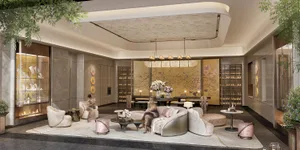 Comfortable and inviting living space with a couch, dining table, decorative elements, and high-quality furnishings