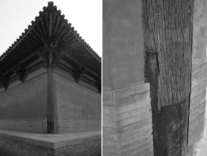 Traditional Asian building with a large roof, archway, and windows, featuring a mix of wooden and stone elements
