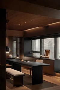 A well-lit dining area with a wooden table surrounded by two chairs, ideal for socializing and meals