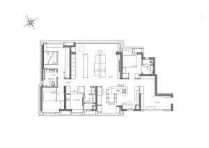 Black and white floor plan of a traditional house with open spaces, archways, and symmetrical layouts, featuring wood and stone materials and ample natural light