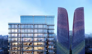 Modern city skyline with two buildings featuring a purple facade and glass exterior, multiple windows, and parked cars