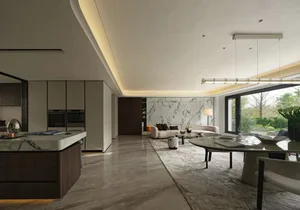 Open living area with white walls and floors, featuring two couches, a chair, vases, and bottles, with a spacious and inviting atmosphere
