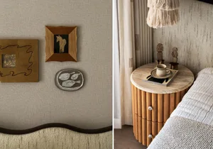 A well-lit bedroom with wall decor, a wooden dresser, and a fish plate, creating a comfortable atmosphere