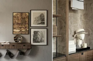 A warm and inviting living space with wooden floors and walls, featuring artwork, decorative elements, and a bookshelf