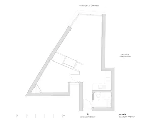 Black and white floor plan of a residential building with multiple rooms, dimly lit, and featuring concrete materials