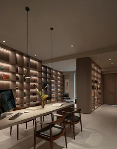 Cozy modern living space with a large bookshelf, chairs, a dining table, and a TV, featuring a comfortable and inviting atmosphere