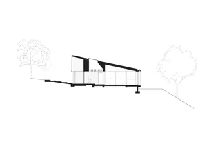 A modern house on a hillside with large windows, natural light, and two people in the scene, creating a comfortable and inviting living environment