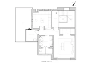 A modern interior design featuring white walls and floors, with a clean and minimalist aesthetic