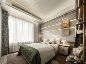 A well-organized bedroom with a white bed, nightstands, and natural light from a window
