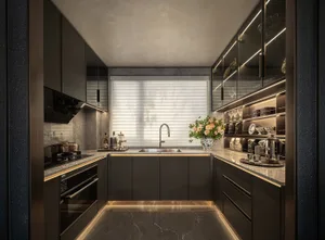 Modern kitchen with a sink, refrigerator, oven, and decorative elements, including vases, bottles, and wine glasses
