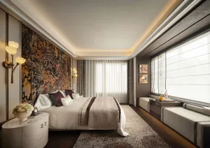 Cozy bedroom with a white bed on a carpeted floor, a modern design, and a wallpapered ceiling, with two windows providing natural light