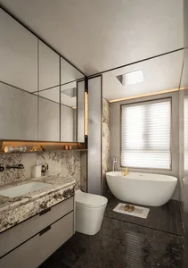 Bathroom with a white bathtub, toilet, sink, and shower area, surrounded by marble walls and a window for natural light