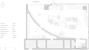 2D floor plan of a modern room with a circular shape, featuring a mail area and kitchen, with linework, labels, and measurements