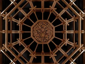A wooden building with a round window, natural light, and a warm atmosphere