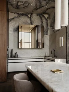 A modern bathroom with a white marble countertop and a large reflective mirror, surrounded by natural light and high-quality materials