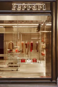 A store display showcasing handbags and shoes in a visually appealing and organized arrangement