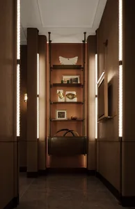 A modern hallway with a brown color scheme, featuring a shelf with a handbag and vase, and well-lit with a focus on functionality and organization