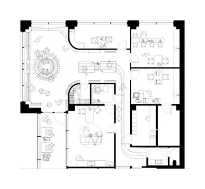 Black and white floor plan of a modern house with a functional layout, featuring a living room, dining room, and kitchen with furniture and appliances